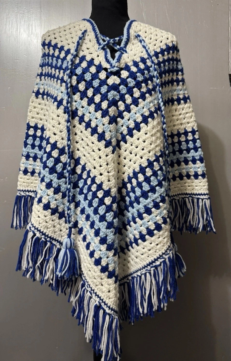 Crochet Poncho Blue Navy White Granny Square Knit Boho Fringe Coastal Grandma
Opens in a new window