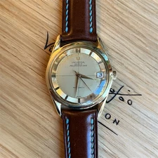 Universal Geneve, Polerouter Date, gold plated, 35mm case strap cream dial