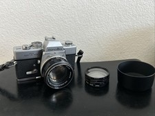 Minolta SRT-101 35mm SLR Film Camera With Mc Rokkor -PF F58mm And Lens Filter