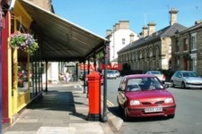 PHOTO  2005 VICTORIAN POST BOX  SALTBURN PROTECTED BY SHOP AWNINGS!