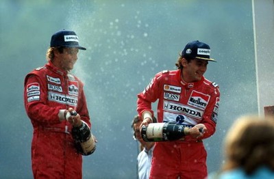 Winner Ayrton Senna right celebrates with team mate and third Gerh- Old Photo