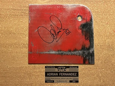 Pieza de placa de deslizamiento IndyCar firmada por Adrián Fernández #9-ROAD AMERICA, 2000