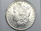 1889-O Morgan Dollar in almost uncirculated