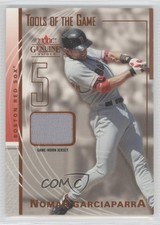 2004 Fleer Genuine Insider Tools of the Game Materials Nomar Garciaparra 0v1