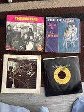 A Collection Of The Beatles 45’s featuring Ask Me Why Love Me Too Help Twist 
