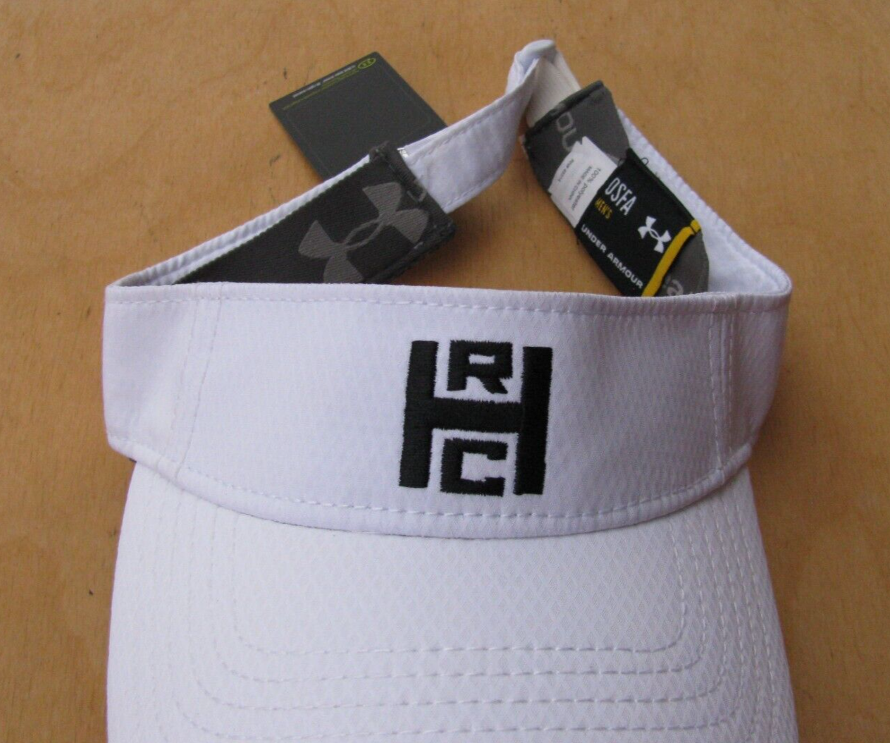 BRAND NEW MENS WHITE UNDER ARMOUR GOLF VISOR HRC GOLF LOGO ADJUSTABLE