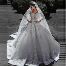 Glamorous Ball Wedding Dresses Lace Applique V-neck Illusion Long Sleeves Gowns