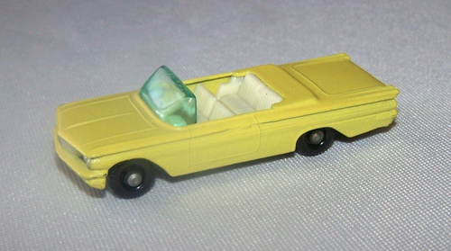 Matchbox Lesney no. 39 Pontiac Convertible yellow w/ black base, black wheels NM