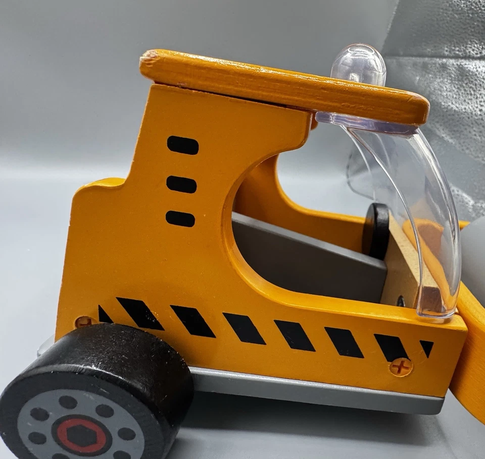 Vehículo de construcción de rodillos de madera duradero Hape para niños de 3 años Foto 3 de 4