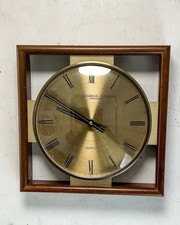 Dugena Atelier Teak und Messing Mid Century Quarz Wanduhr 25x25cm