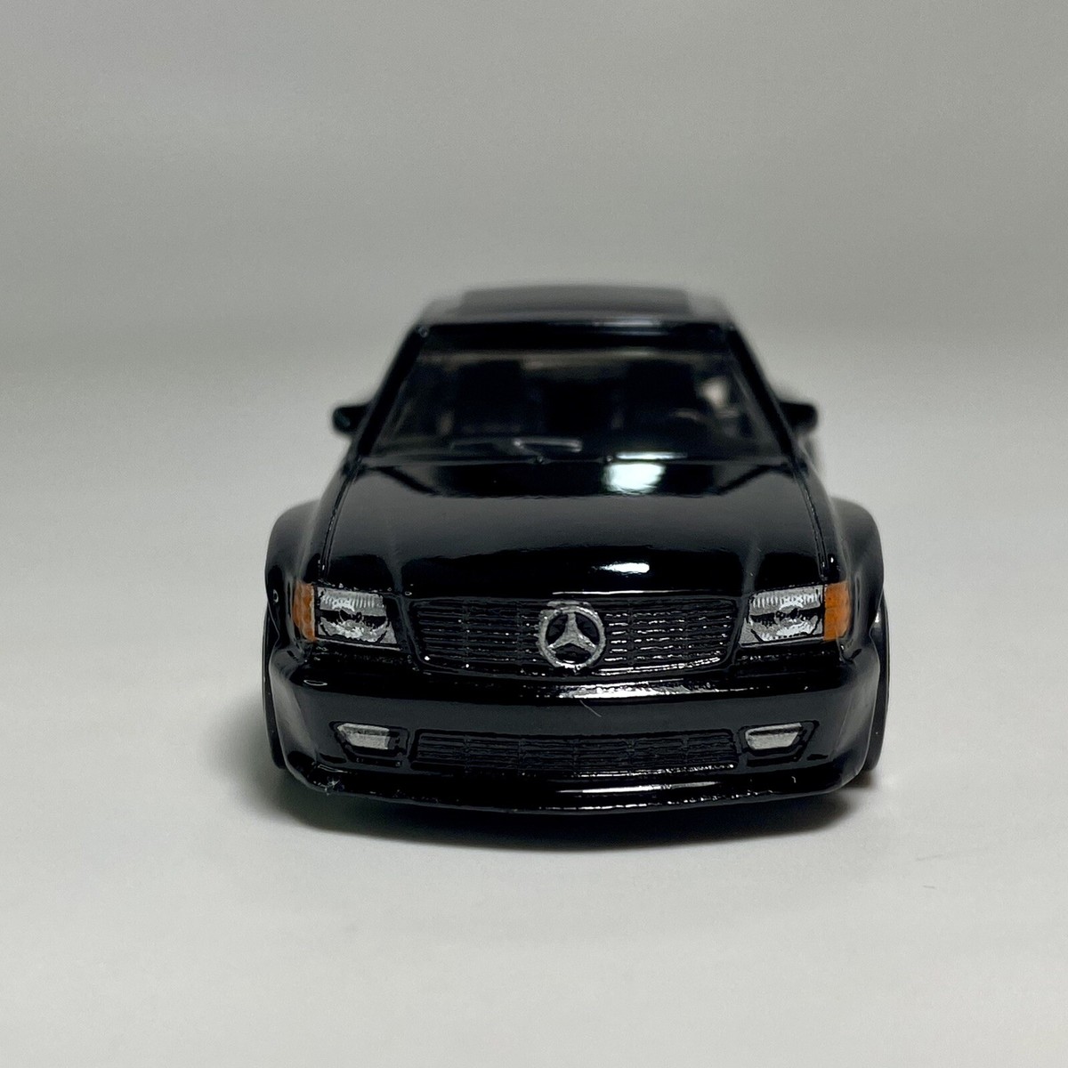 1989 Mercedes-Benz 560 SEC AMG Black 1:64 Scale Diecast Diorama