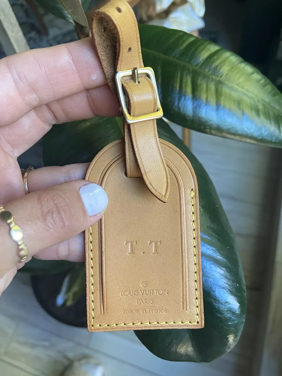 louis vuitton leather tag