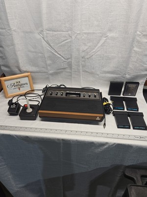 Atari 2600  Heavy Sixer  Six Switch Woodgrain Console Works Sunnyvale + Games