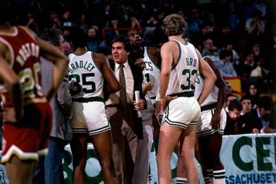 Larry Bird and Bil Fitch head coach Boston Celtics talk in the hud- Old Photo