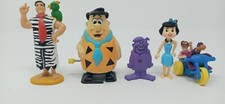 The Flintstones figures: Fred x 2, Barney, Betty, Pebbles with Dino