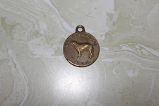 VINTAGE BRONZE TOKEN FROM WOLFSCHMIDT'S VODKA
