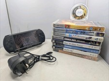 PSP E1000 "Street" Console, Black, With 5 Game,4 umd Films &Charger Bundle