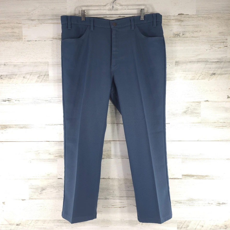 PANTALONES DE POLIÉSTER VINTAGE LEVI'S AZUL PARA HOMBRE TALLA 38x26 lengüeta negra hechos en estados unidos defectos Foto 3 de 4