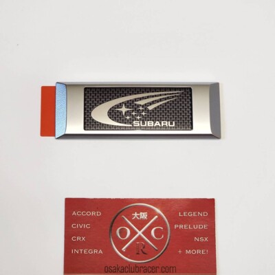 Genuine OEM 02-07 Subaru WRX STi World Rally Team Rear Emblem Genuine OEM 02-07 Subaru WRX STi World Rally Team Rear Emblem