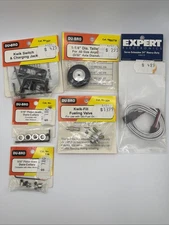 Lot of 6 Du-Bro RC Airplane Parts New Sealed Kwik Switch/Tailwheel/Valve/Collars
