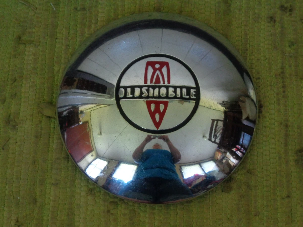 Oldsmobile dog cheap dish hubcaps