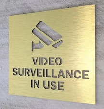 Video surveillance in use. Video security sign. Security camera sign.