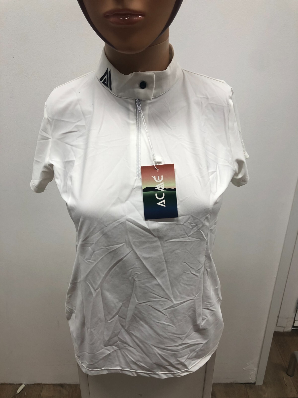 Polo Atria Acmé fini la transpiration sous votre veste de concours grâce au tissu dry-fit