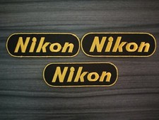 Logo Nikon black ground Iron on Patches Embroidered Sew on Jean Jacket Hat Bag