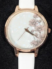 Charming Charlie Flower Dial Round Gold Tone Case White Faux Leather Band Watch