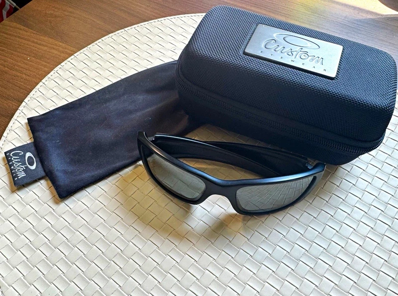 custom Oakley Fuel Cell with a mirror polarized lens at $40