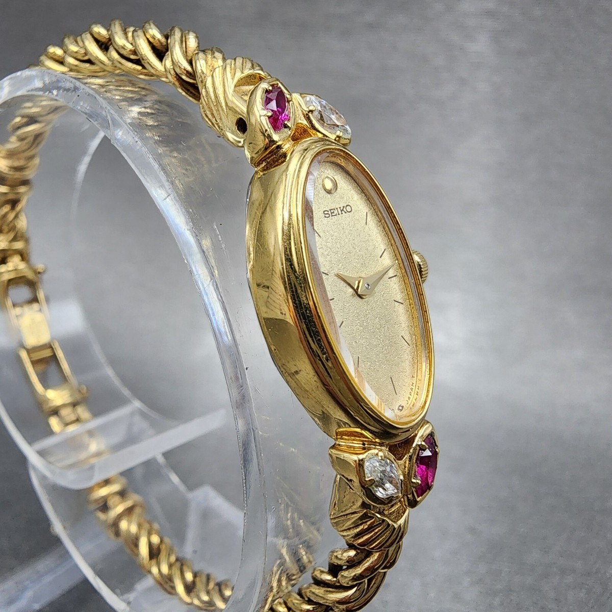 Seiko Watch Women 13mm Champagne Dial Gold Tone Diamonds