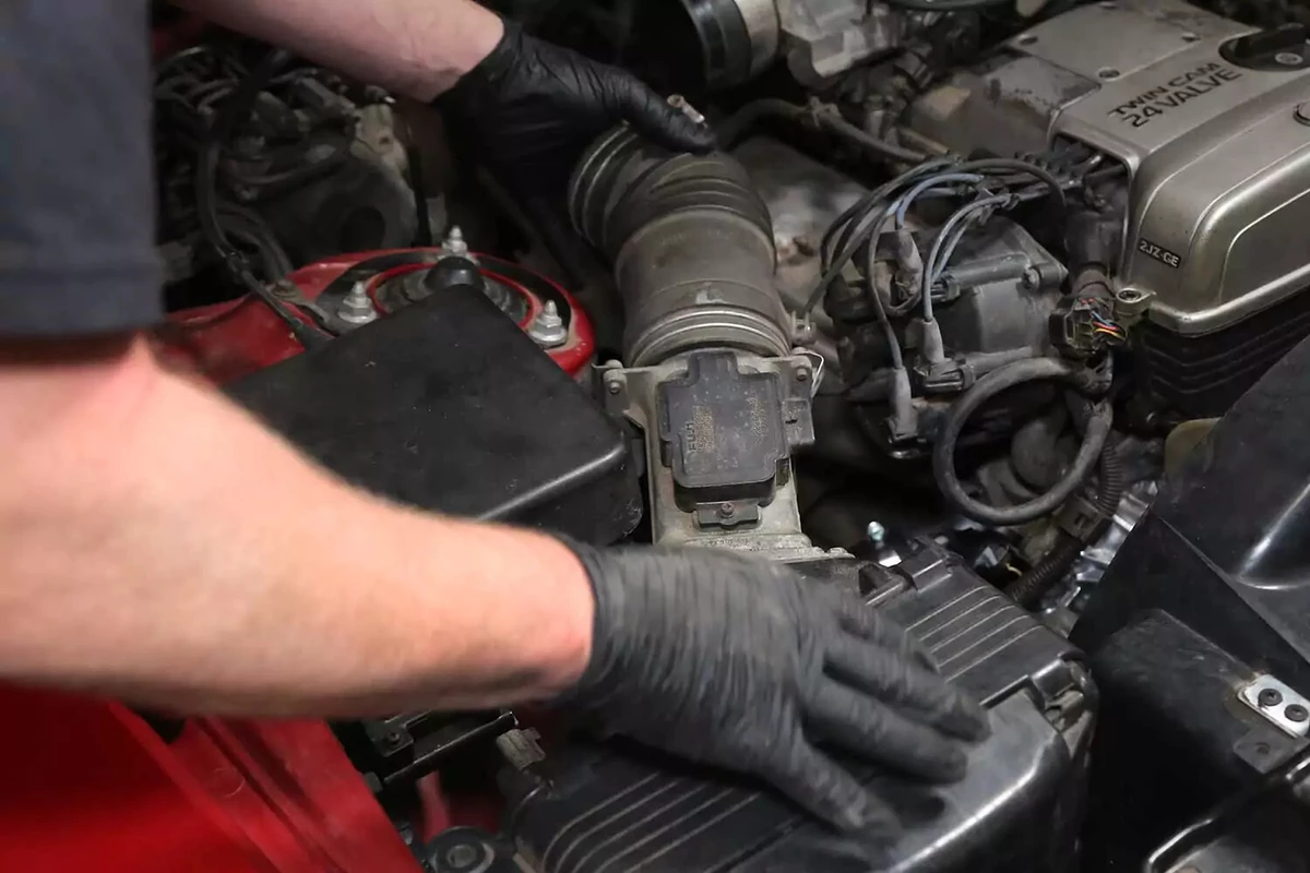 Reinstalling the air intake.
