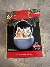 1991 Hallmark Keepsake Ornament Bringing home The Tree Magic Light and Motion