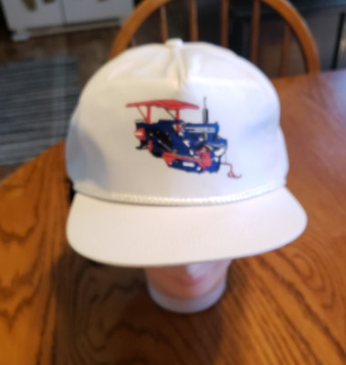 BROUWER  WHITE WITH A BLUE TRACTOR DECAL  HAT/CAP ADJUSTABLE STRAP ONE SIZE