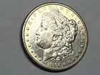 1890-CC Carson City Morgan U.S. silver dollar. AU. cleaned. Rev is semi-pl. #rd1