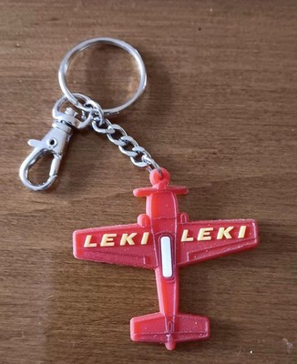 Leki red airplane Keychain.  Came with high end LEKI World Cup ski racing poles