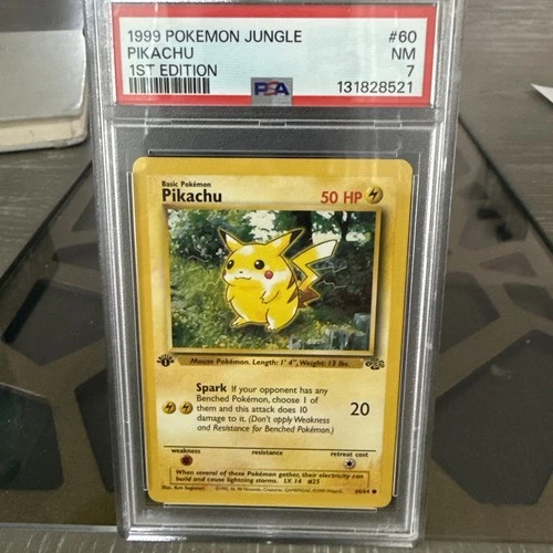PSA 7 Near Mint Pikachu 1st Edition #60 - 1999 Pokemon Jungle