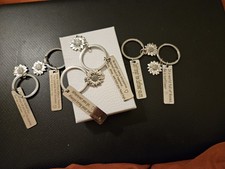 5 Stainless steel sunflower engraved keychain featuring a sunflower