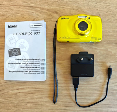 Nikon COOLPIX S33 Yellow 13.2MP Waterproof Digital Camera + Charger