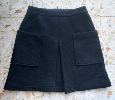 HUGO BOSS Rock schwarz 100% Wolle Taschen Kellerfalte vorn Futter De 34/36