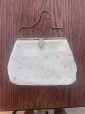Vintage 1950 s. Vintage beaded evening bag is a mid-century clutch