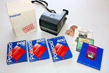 Polaroid Camera Spirit 600 w box manuals and 3 Instant Films Expired as seen LI