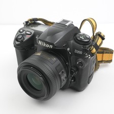 Nikon D200 DSLR Camera with Nikkor 35mm f/1.8 DX Lens, 3 Batteries, and Charger