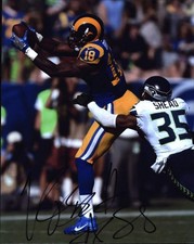 Kenny Britt signed NFL football 8x10 photo W/Cert Autographed 02
