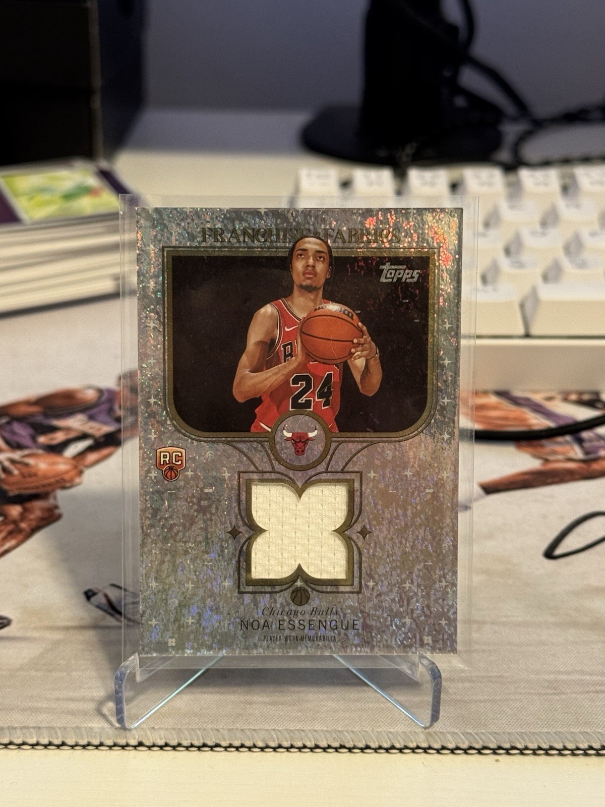 1-2025 Topps NOA ESSENGUE  FRANCHISE FABRICS RC SAND GLITTER RELIC #FF-NE Foil!!