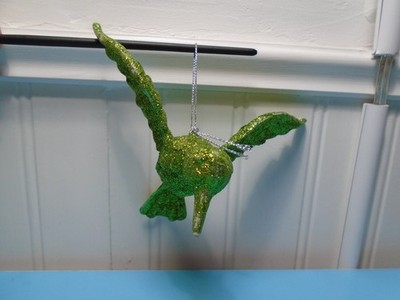 GREEN GLITTERED PLASTIC HUMMINGBIRD 3.5'' X 5'' ORNAMENT UNRANDED (CB5047)