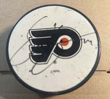 Autographed Sami Kapanen Philadelphia Flyers Hockey Puck Dirty front