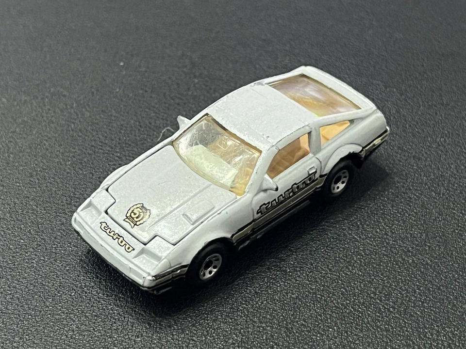 Matchbox Nissan 300ZX Turbo Diecast 1986 gris y negro como nuevo 1:58 Macao Foto 2 de 4
