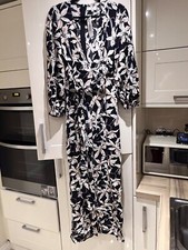 Rare London floral jumpsuit new with tags