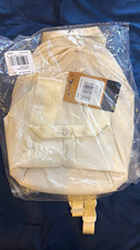 The North Face Mini Stop Mini Backpack 6L White Dune Padded Zip Logo